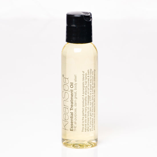 small bottle of tropical body oil