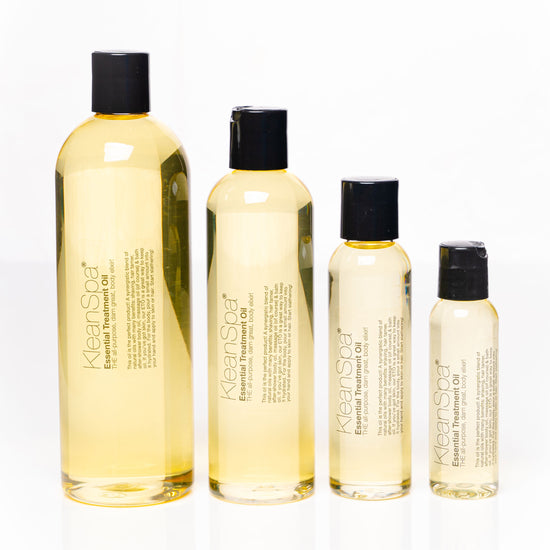 bottles of custom scented body oil