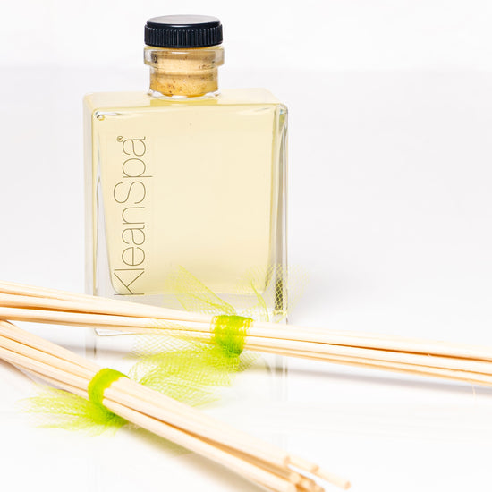 scented reed diffuser with several reeds