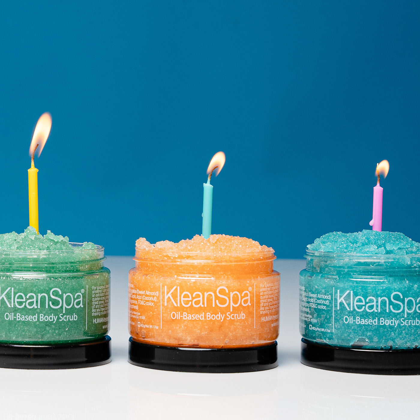 sugar scrubs with a birthday candle in each scrub - great for gifting!